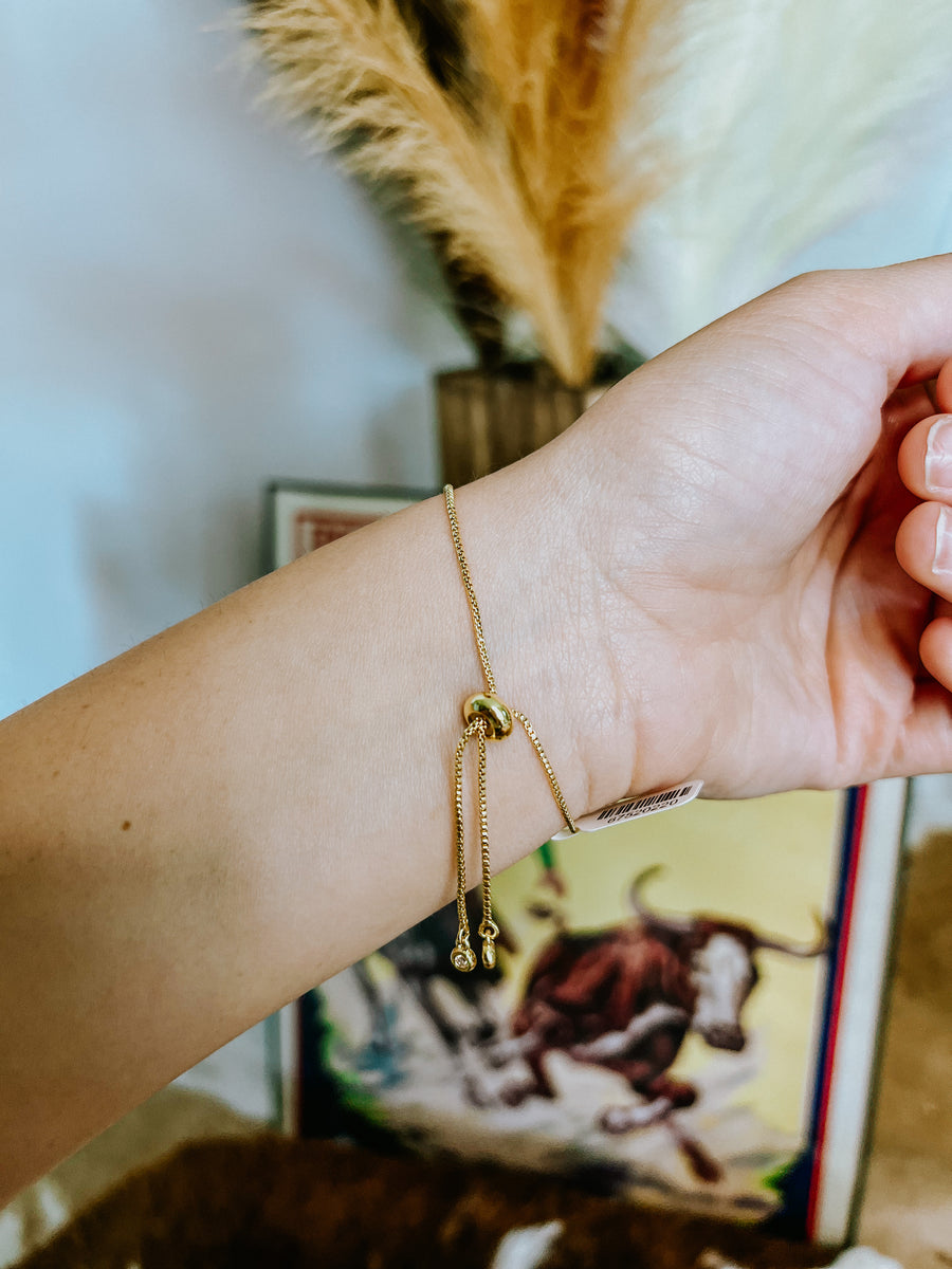 The Gold Cross Slider Bracelet